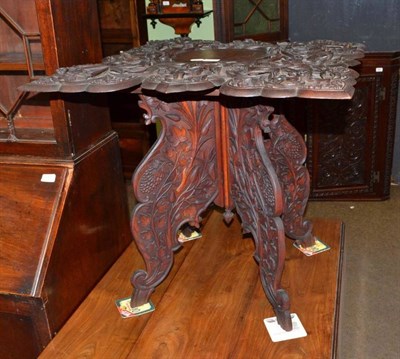 Lot 812 - Carved occasional table