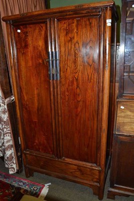 Lot 813 - A Chinese two door cupboard