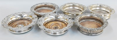 Lot 133 - Three Pairs of Silver Plate Wine-Coasters,...