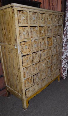 Lot 819 - A Chinese apothecary cabinet