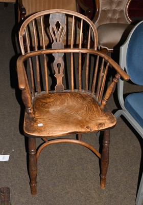 Lot 1267 - A 19th Century Ash and Elm Windsor Chair, with...