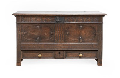 Lot 299 - A Carved Oak Chest, late 17th century, the...