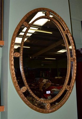 Lot 846 - A 19th century gilt framed oval mirror with border