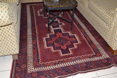 Lot 847 - Fired Earth hand woven rug, red ground, made in Iran