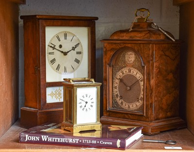 Lot 6 - A Burr Walnut Striking Mantel Clock, twin...