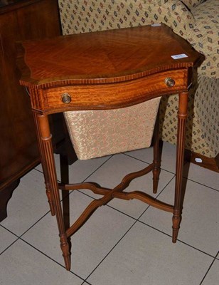 Lot 850 - A satinwood work table with ebonised parquetry inlay