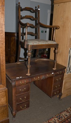 Lot 1289 - A Mahogany Kneehole Desk, with gadrooned...