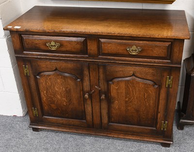 Lot 1314 - A Titchmarch and Goodwin Oak Cupboard, 107cm...