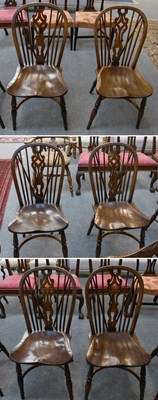 Lot 1222 - A Set of Six Ash and Elm Windsor Chairs, each...