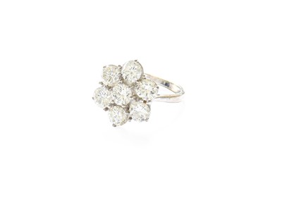 Lot 316 - A Diamond Cluster Ring, the central raised...