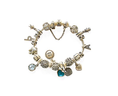 Lot 304 - A Charm Bracelet, by Pandora, the snake link...