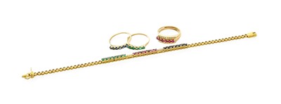 Lot 328 - An Emerald, Ruby, Sapphire and Diamond...