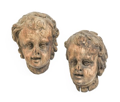 Lot 134 - A Pair of Italian Carved Wood Masks, in...