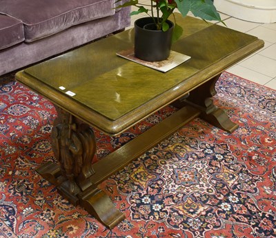 Lot 1366 - A 20th Century Oak Coffee Table, with carved...