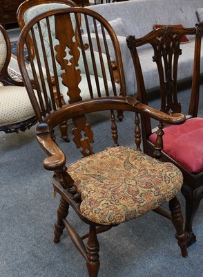 Lot 1223 - A Broad Arm Elm Windsor Chair