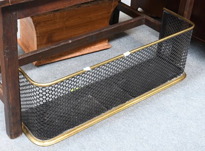 Lot 1243 - A 19th Century Pierced Brass Nursery Fender,...