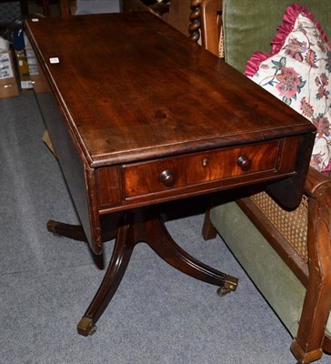 Lot 920 - A 19th century mahogany table, with drop ends on turned support