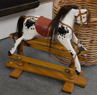 Lot 1145 - A Small Painted Wooden Rocking Horse, on...