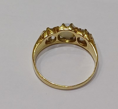 Lot 23 - An Opal and Diamond Three Stone Ring, the...