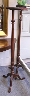 Lot 1366 - A Pair of Mahogany Torchere, on fluted...