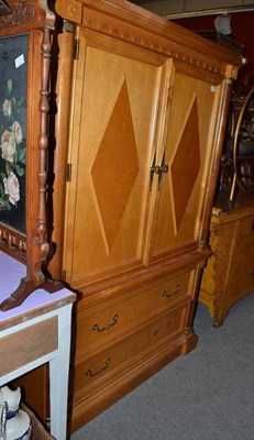 Lot 937 - A reproduction TV cabinet