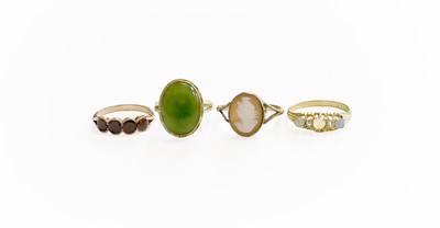 Lot 334 - Four Gem-Set Rings, comprising of a nephrite...