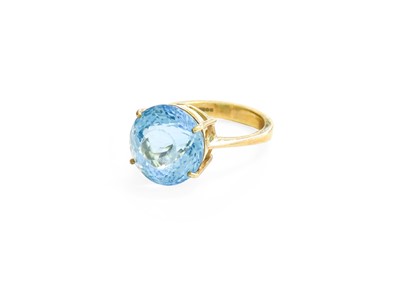 Lot 348 - A 9 Carat Gold Blue Topaz Ring, the round cut...