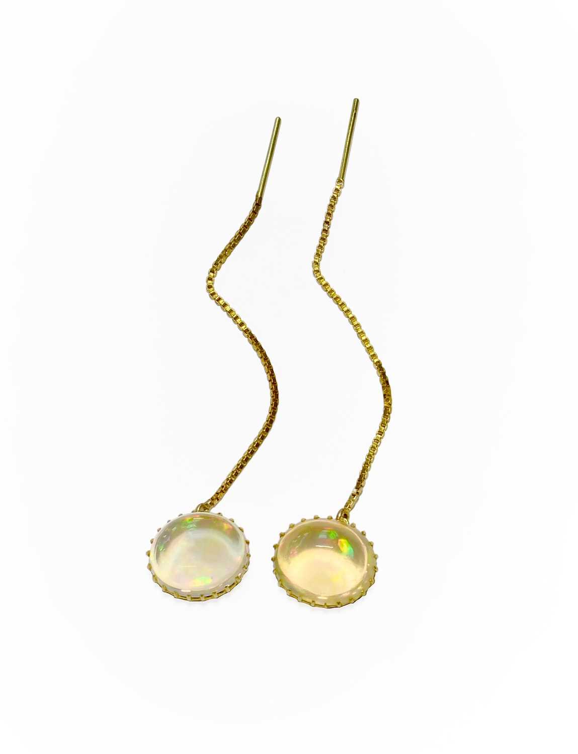 Lot 6 - A Pair of Opal Earrings, the oval cabochon...
