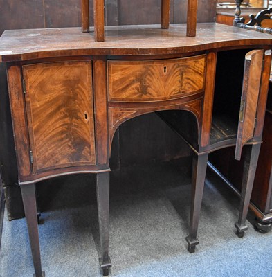 Lot 1185 - A George III Mahogany Serpentine Sideboard, of...