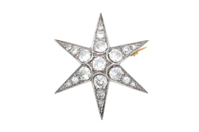 Lot 2278 - A Diamond Star Brooch a round brilliant cut...