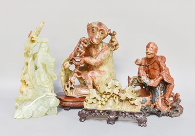 Lot 198 - A Chinese Soapstone Carving of a Monkey and...