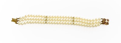 Lot 331 - A Triple Row Cultured Pearl Bracelet, each row...