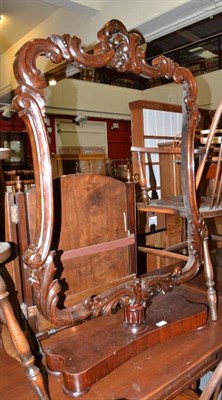 Lot 975 - A Victorian rosewood firescreen on a pivot base