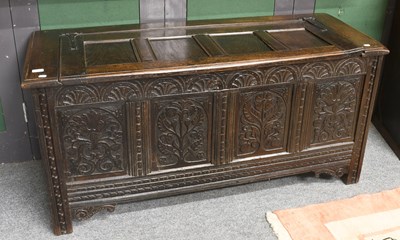 Lot 1311 - An 18th Century Carved Oak Four Panel Coffer,...