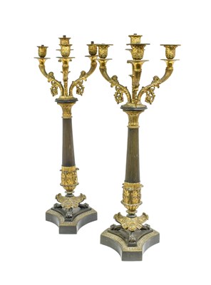 Lot 205 - A Pair of Patinated Bronze and Parcel Gilt...