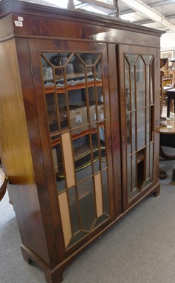 Lot 1259 - A Georgian Style Mahogany Bookcase, with twin...