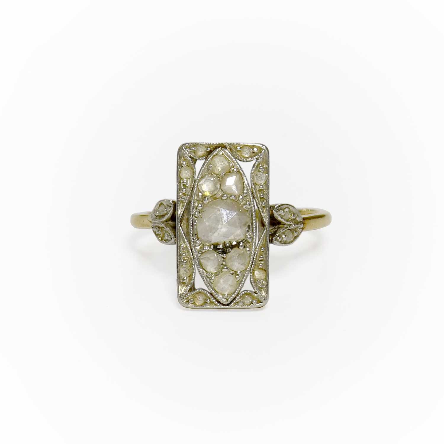 Lot 32 - A Diamond Ring, the pierced rectangular plaque...