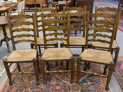 Lot 1304 - A Set of Six Reproduction Ladder Back and Rush...