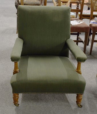 Lot 1217 - An Oak Framed Open Armchair, upholstered in...