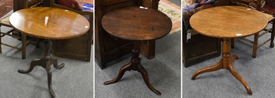 Lot 1302 - Three George III Oak Tilt Top Tripod Table,...