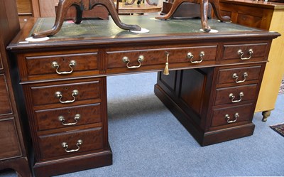 Lot 1192 - A Mahogany Pedestal Desk, with green leather...