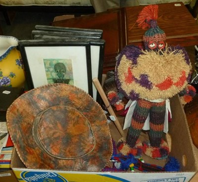 Lot 1033 - A Nigerian Witch Doctor's doll; a painted snakeskin hat; a Syrian brightly coloured horse...