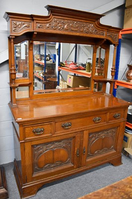 Lot 1168 - An Early 20th Century Oak Mirror Back...