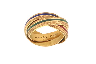 Lot 2247 - An Enamel Ring, by Hermès comprised of three...