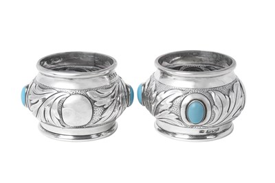 Lot 2147 - A Pair of Edward VII Turquoise-Set Silver Napkin-Rings