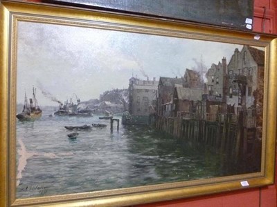 Lot 1050 - John Falconer Slater (1857-1937) a view of buildings and tug boats possibly on the Tyne signed, and