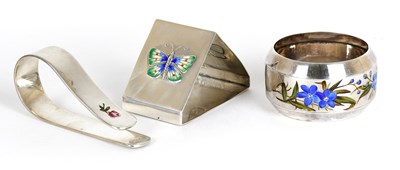 Lot 1 - Three Various Silver and Enamel Napkin-Rings,...