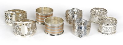 Lot 39 - Eight Assorted Silver Napkin-Rings, including...