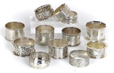 Lot 73 - Twelve Assorted Silver Napkin-Rings, variously...