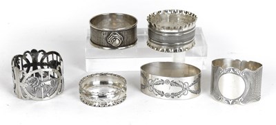 Lot 49 - Six Assorted Silver Napkin-Rings, including...